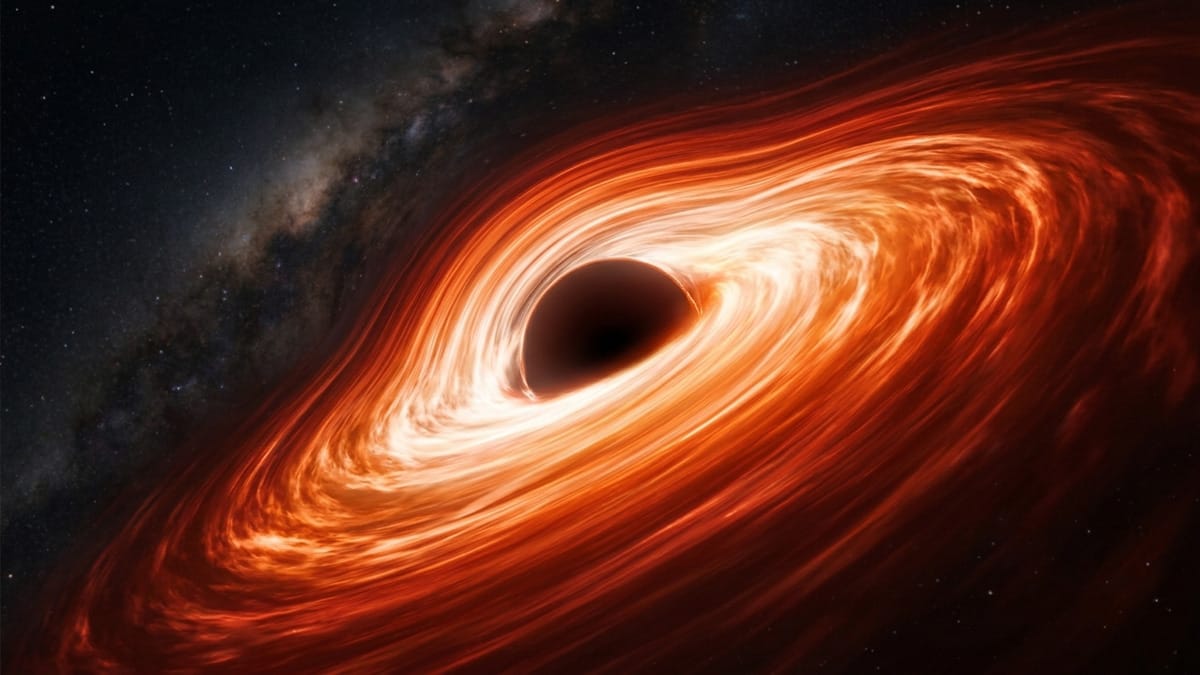 Materia brillante formando un disco de acreción alrededor de un núcleo oscuro.