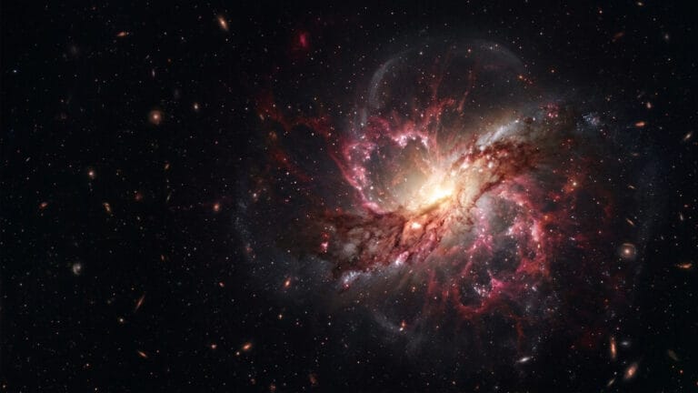 Ilustración editorial de una galaxia primitiva con un agujero negro temprano.