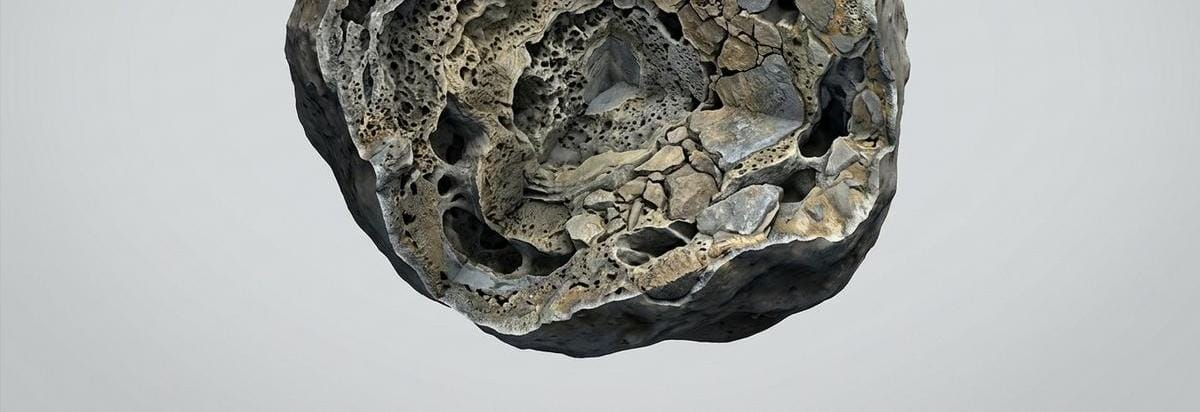 Corte técnico del interior de Fobos mostrando capas, porosidad y una estructura mixta con fragmentos y vacíos